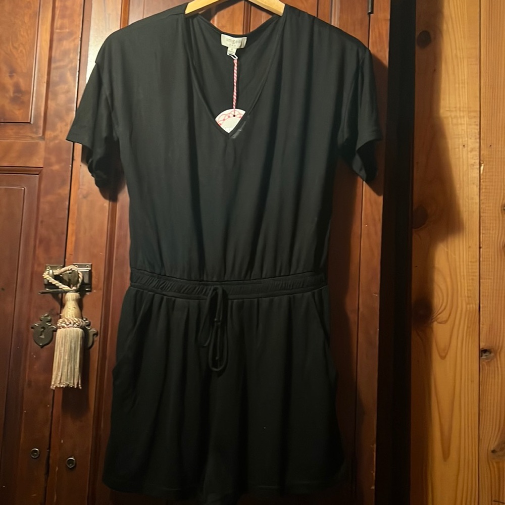 UMGEE NWT BLACK ROMPER SIZE S.